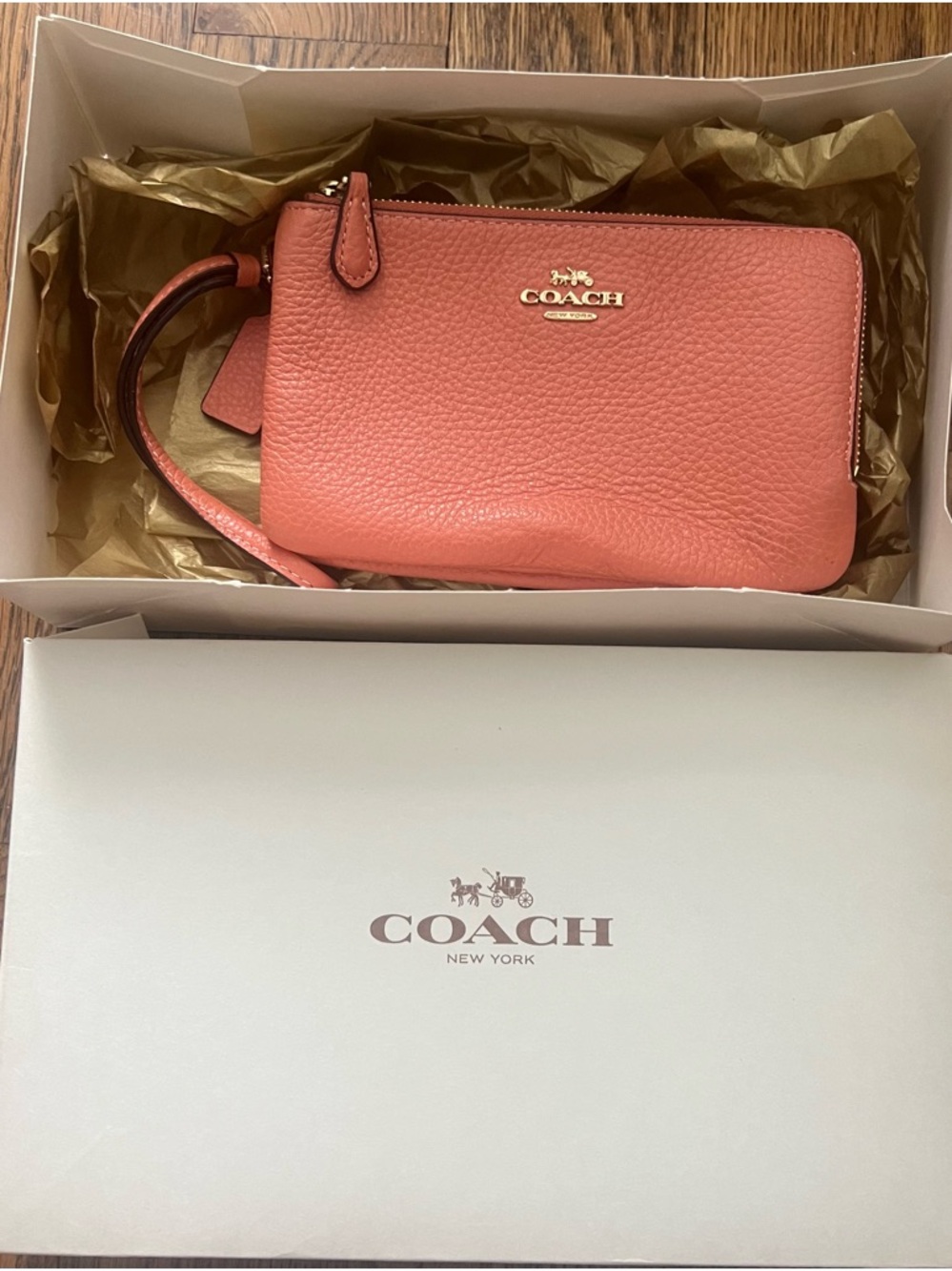 COACH Coral Pebbled Leather Wristlet with Gold Logo